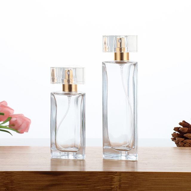 Prisme triangulaire Unique de luxe, bouteilles en verre de parfum vides de 30ml 45ml, avec couvercle de pulvérisation à pompe et boîte personnalisables