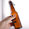 Bouteille vide en gros de bière brune de 330 ml 500 ml 1000 ml à couvercle rabattable