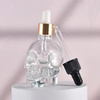 Flacon compte-gouttes en verre de bouteille d'huile essentielle de crâne vide Unique de 50 ml