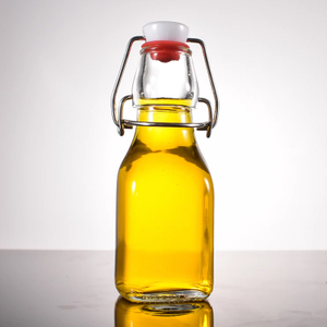 Bouteilles en verre à couvercle rabattable transparent de 120 ml