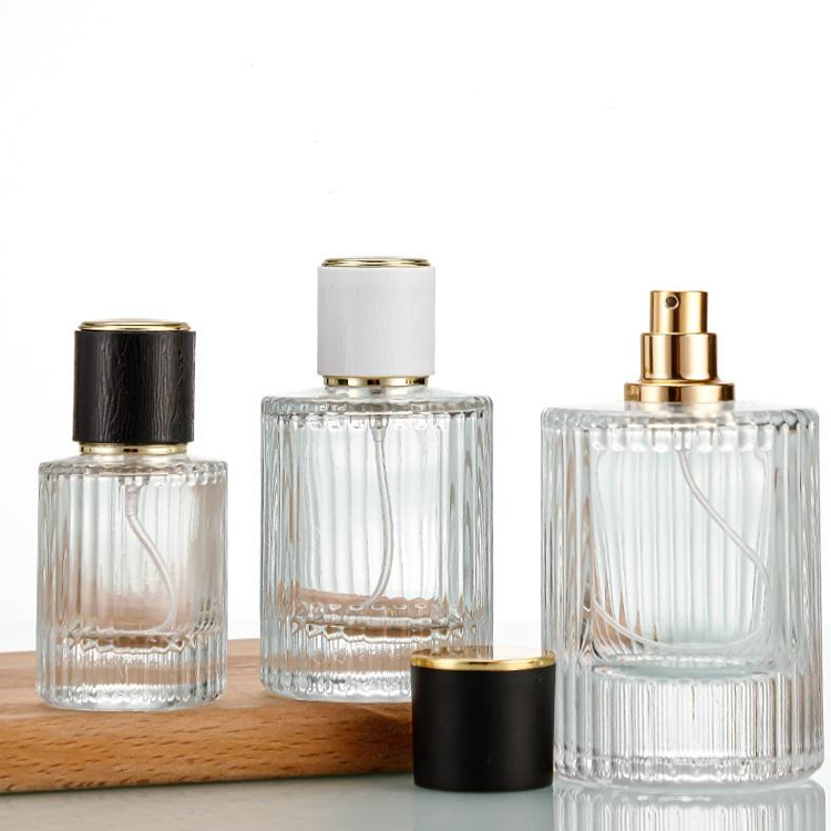 Bouteille de Parfum à rayures verticales personnalisée, emballage rond vide d'atomiseur de Parfum de luxe de 30ml 50ml 100ml 