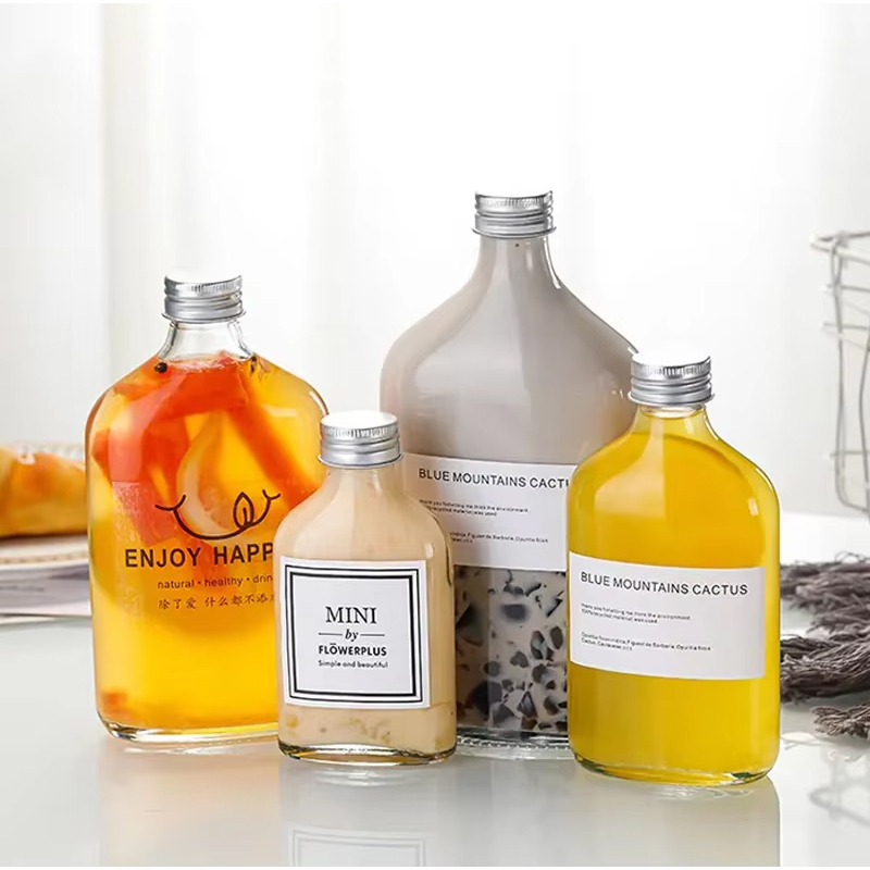 Logo personnalisé de qualité supérieure 50 ml 200 ml 350 ml 500 ml bouteille en verre vide de café bouteille de boisson en vrac