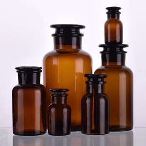 Bouteilles d'apothicaire de réactif en verre chimique clair ambre de style vintage