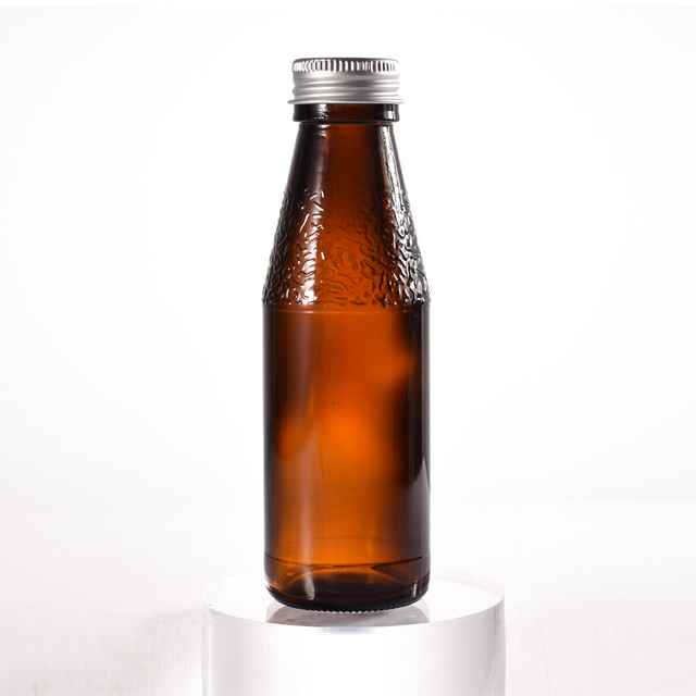 Fabricant de bouteilles de sirop en verre ambré recyclées en verre scellé de 100ml avec capuchon en métal